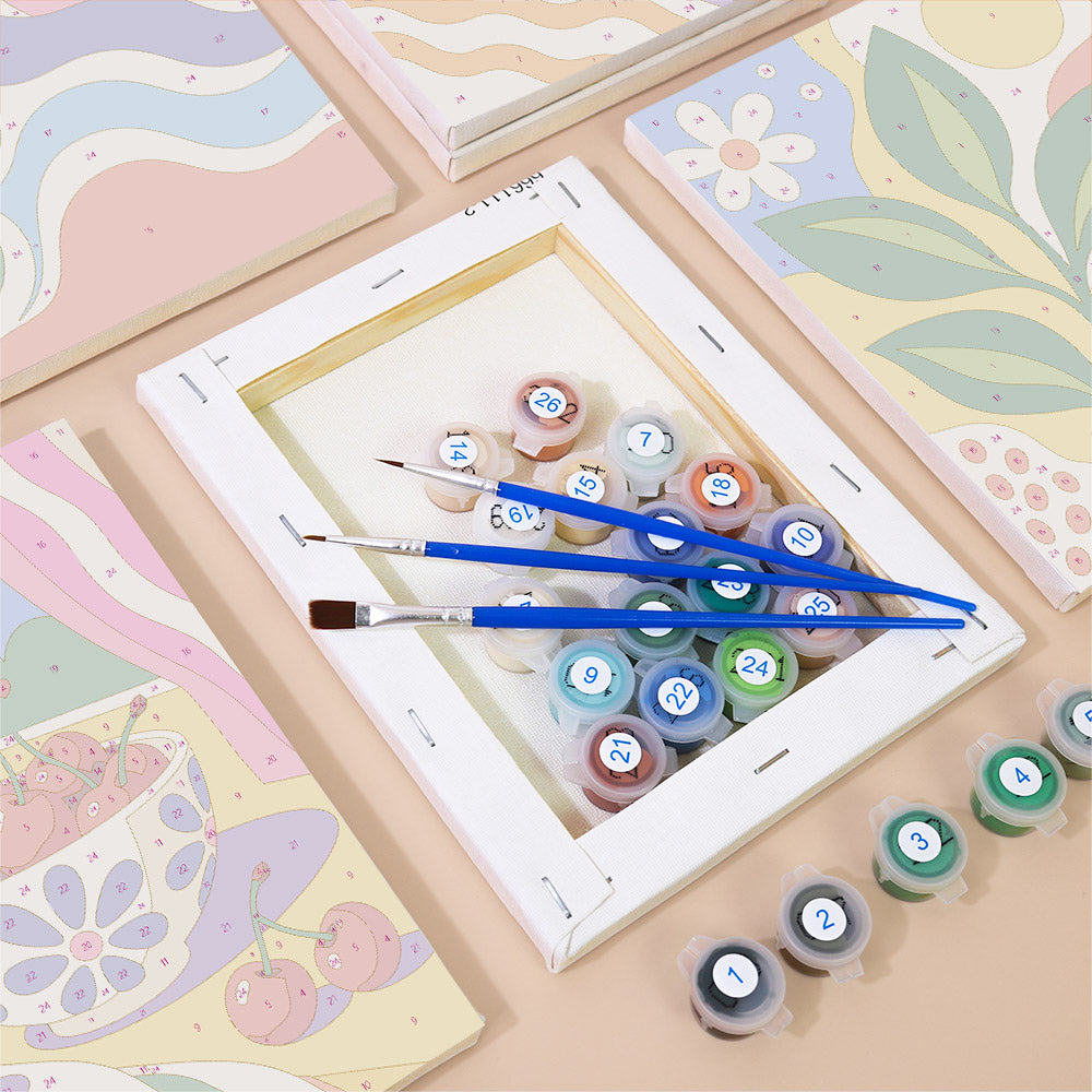 Numbered paint pots and brushes on a pre-stretched Happy Hues mini canvas