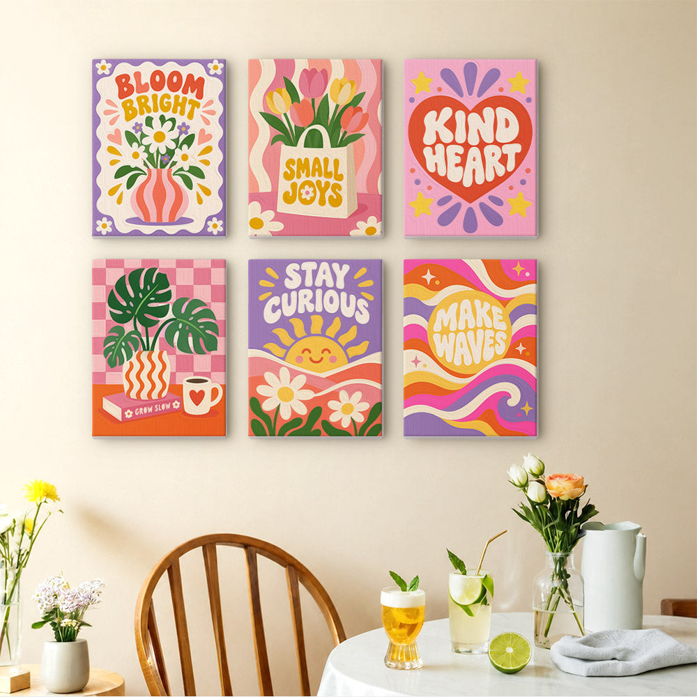 Happy Words mini paintings displayed as a gallery wall in a sunny kitchen