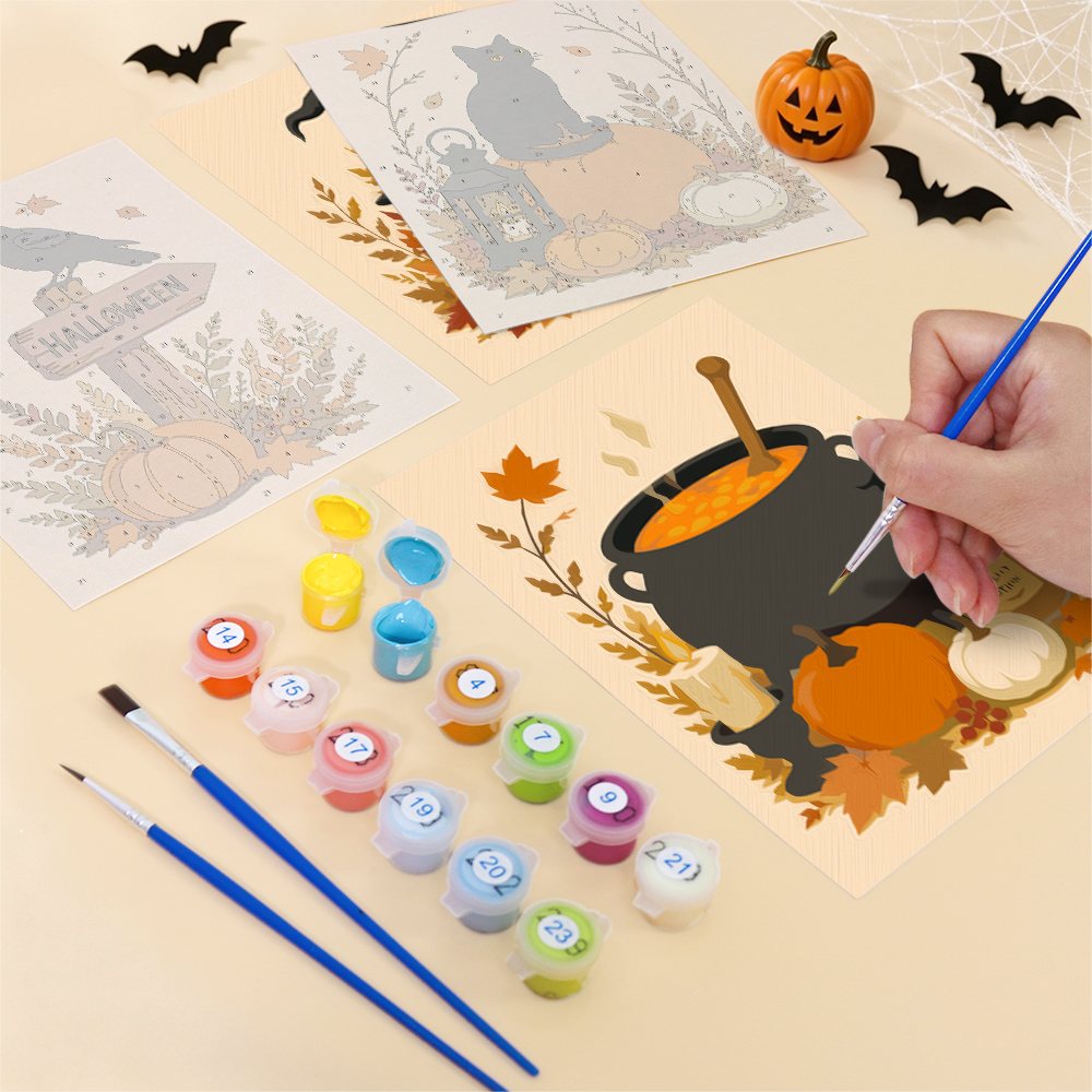 Filling in a Harvest Hauntings mini canvas with numbered acrylic paints and a fine brush