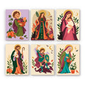 Harvest Saints Folk Art mini paint by numbers set: six folk-art saint portraits with golden halos, pumpkins, autumn leaves, a lamb and a black cat