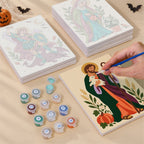Painting one of the Harvest Saints Folk Art designs next to a stack of mini canvases