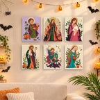 Six finished Harvest Saints Folk Art mini paintings hung on a wall above a table