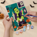 Numbered paint pots and brushes on a pre-stretched Haunted Bathroom Break mini canvas