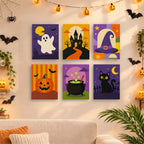 Six finished Haunted Night Icons mini paintings hung on a wall above a table