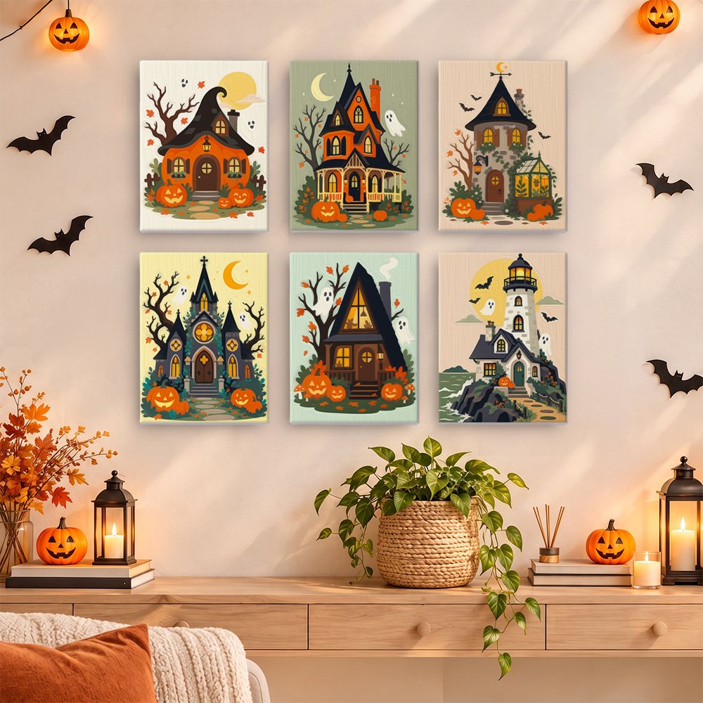 Haunted Pumpkin Cottages mini paintings displayed as a gallery wall in a sunny kitchen