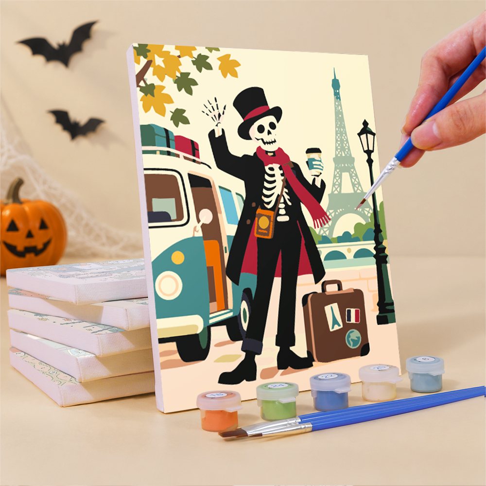 Painting a Haunted World Travelers mini canvas propped up beside numbered acrylic paints