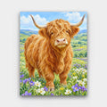 Highland Meadow paint by numbers kit of a shaggy ginger highland cow standing in a meadow of wildflowers