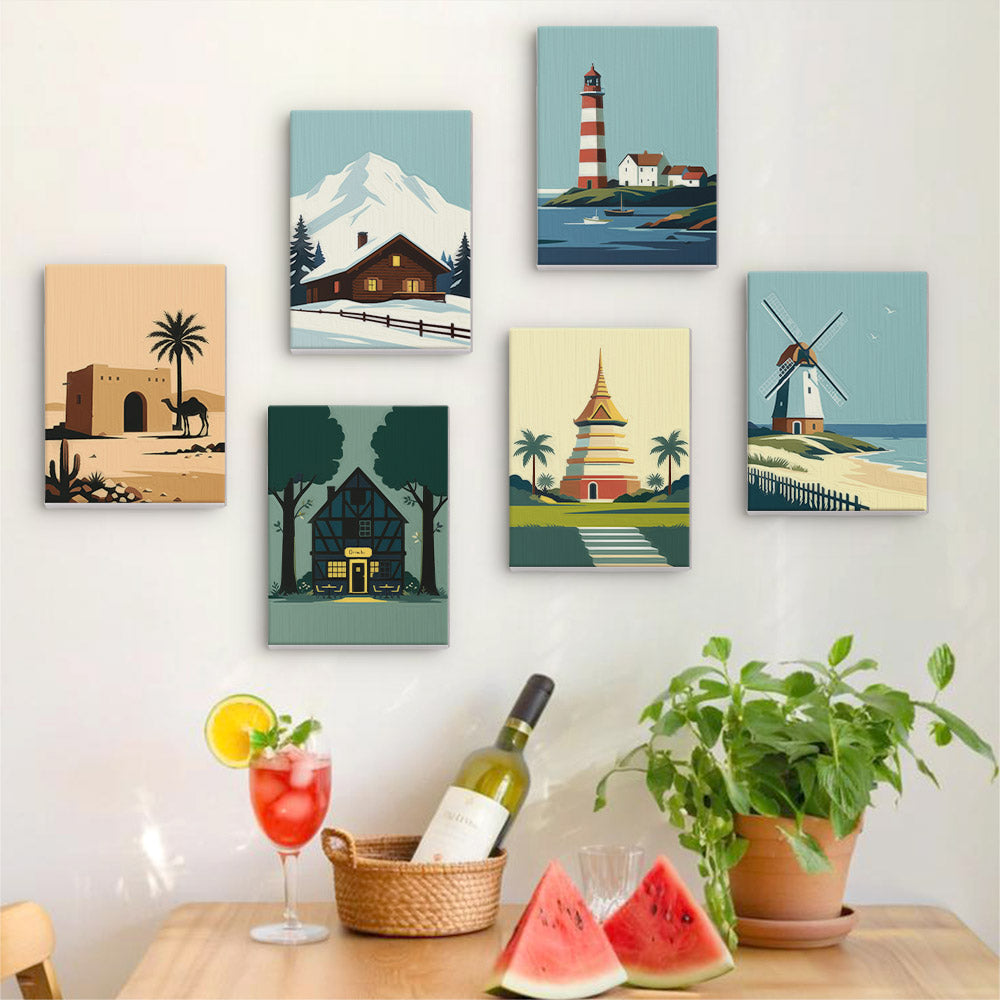 Six finished Homes Around the World mini paintings hung on a wall above a table