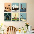 Homes Around the World mini paintings displayed as a gallery wall in a sunny kitchen