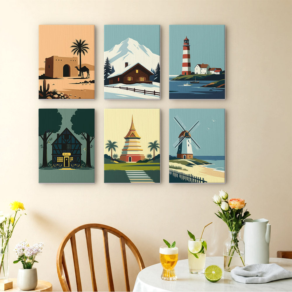 Homes Around the World mini paintings displayed as a gallery wall in a sunny kitchen