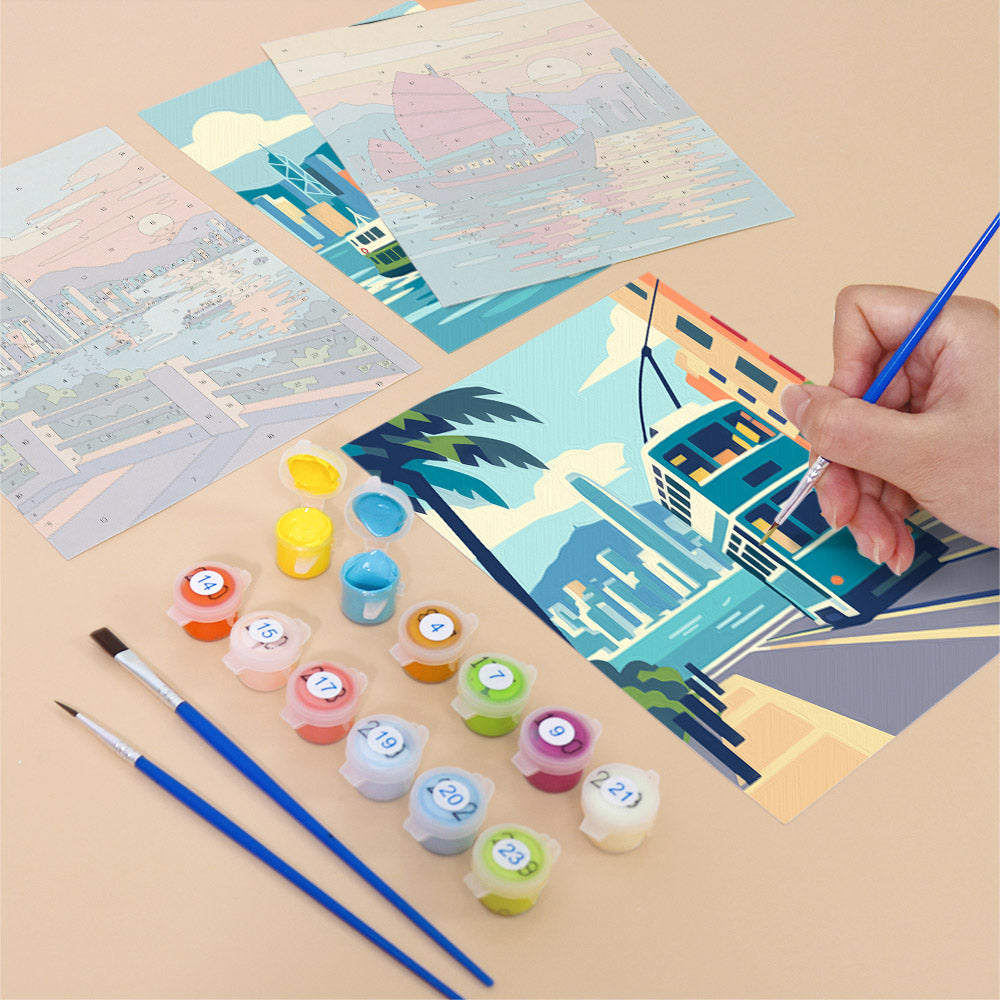 Filling in a Hong Kong Harbor mini canvas with numbered acrylic paints and a fine brush