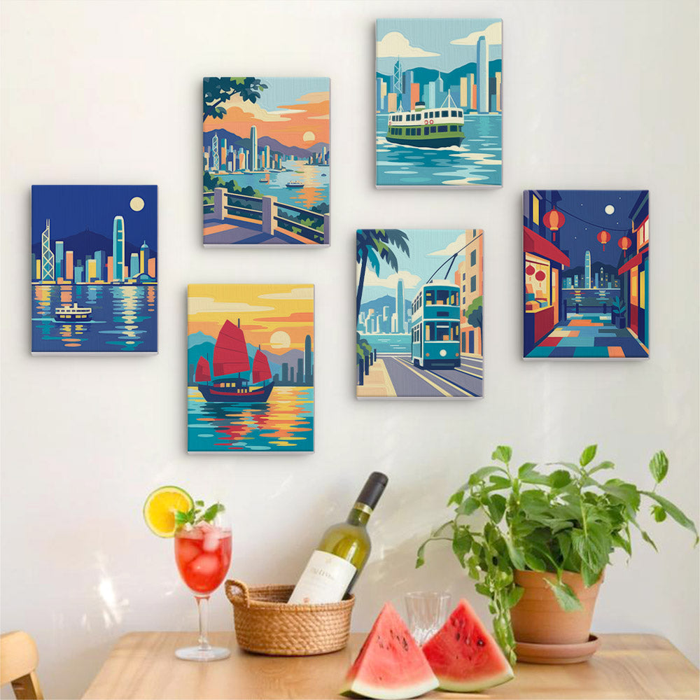 Six finished Hong Kong Harbor mini paintings hung on a wall above a table