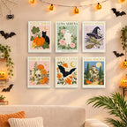 Six finished Italian Halloween Botanicals mini paintings hung on a wall above a table