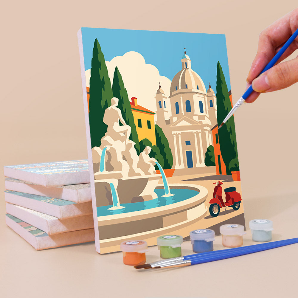 Painting an Italian Holiday mini canvas propped up beside numbered acrylic paints
