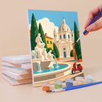 Painting an Italian Holiday mini canvas propped up beside numbered acrylic paints