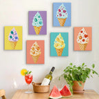 Six finished Jeweled Cones mini paintings hung on a wall above a table