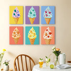 Jeweled Cones mini paintings displayed as a gallery wall in a sunny kitchen