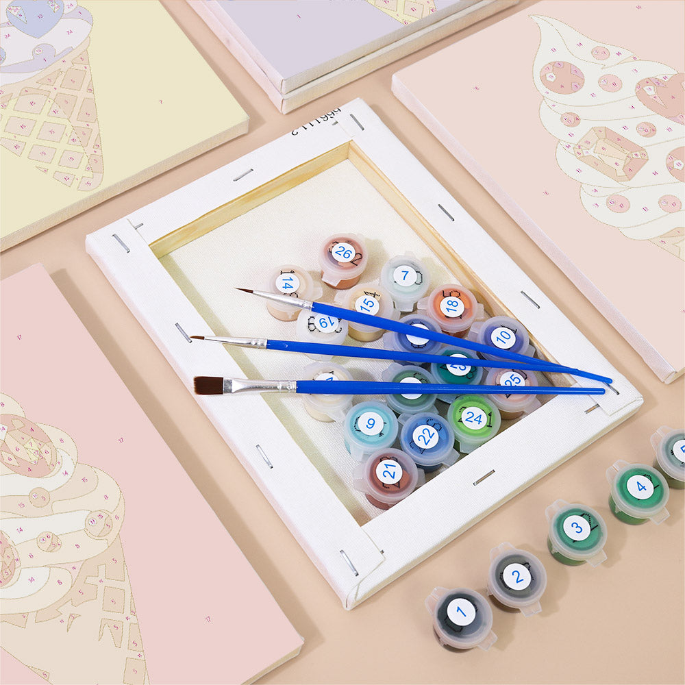 Numbered paint pots and brushes on a pre-stretched Jeweled Cones mini canvas
