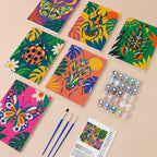 Jungle Bugs mini paint by numbers kit with six numbered canvases, acrylic paints, brushes and layout