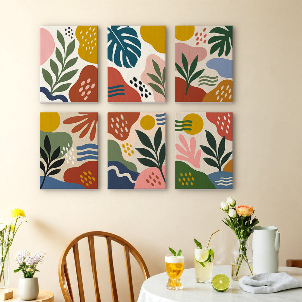 Jungle Collage mini paintings displayed as a gallery wall in a sunny kitchen