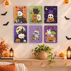 Kawaii Halloween mini paintings displayed as a gallery wall in a sunny kitchen