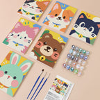 Kawaii Pals mini paint by numbers kit with six numbered canvases, acrylic paints, brushes and layout