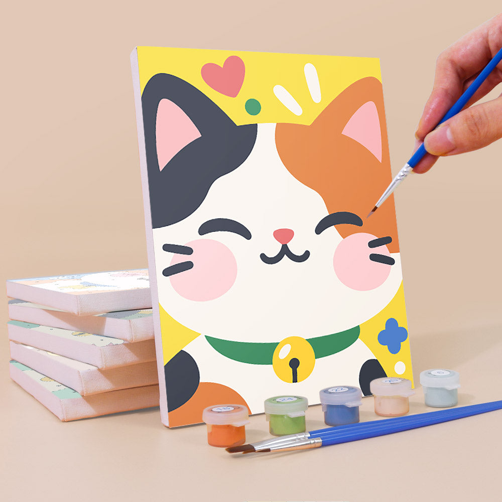 Painting a Kawaii Pals mini canvas propped up beside numbered acrylic paints