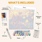 What's included in the Kimono in Moonlight paint by numbers kit: numbered linen canvas, reference sheet, color guide, 24 acrylic paints, 3 brushes and thank you card