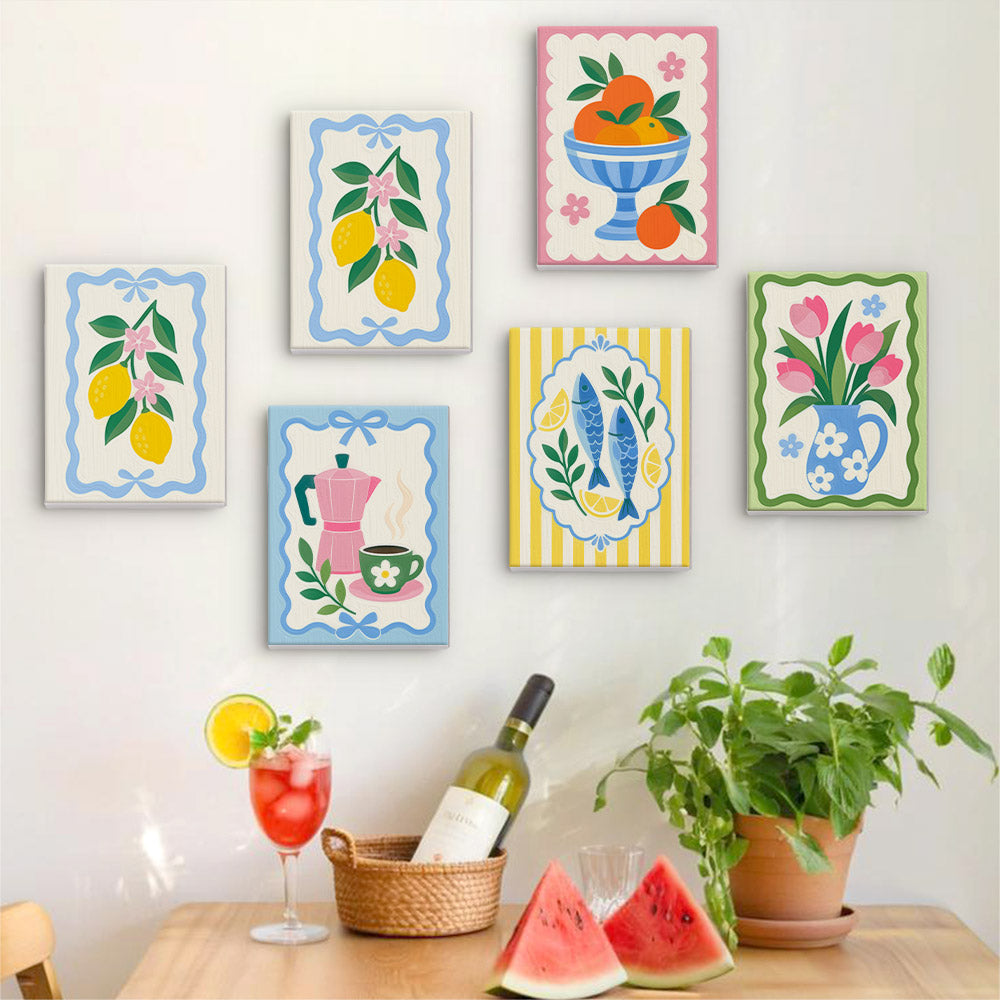 Six finished Kitchen Charm mini paintings hung on a wall above a table