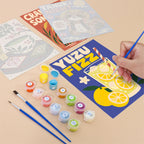 Filling in a Kyoto Posters mini canvas with numbered acrylic paints and a fine brush