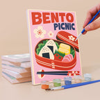 Painting a Kyoto Posters mini canvas propped up beside numbered acrylic paints