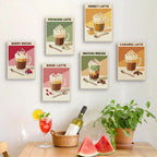 Six finished Latte Menu mini paintings hung on a wall above a table