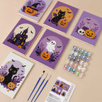 Painting one of the Lilac Moon Medallions designs next to a stack of mini canvases
