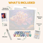 What's included in the Lionfish in the Deep paint by numbers kit: numbered linen canvas, reference sheet, color guide, 24 acrylic paints, 3 brushes and thank you card
