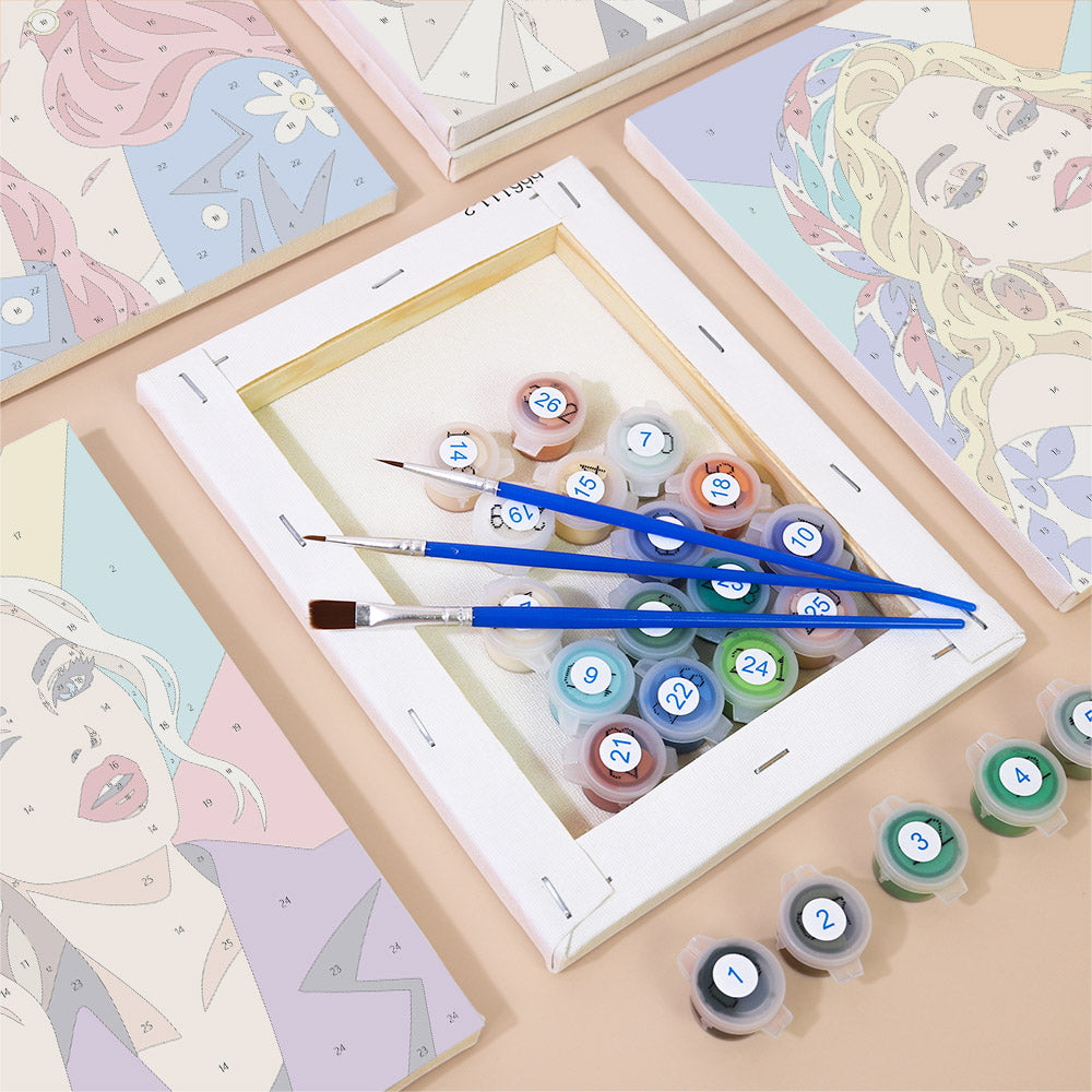Numbered paint pots and brushes on a pre-stretched Lipstick & Attitude mini canvas