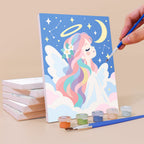Painting a Little Angels mini canvas propped up beside numbered acrylic paints