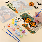 Filling in a Little Autumn Witches mini canvas with numbered acrylic paints and a fine brush