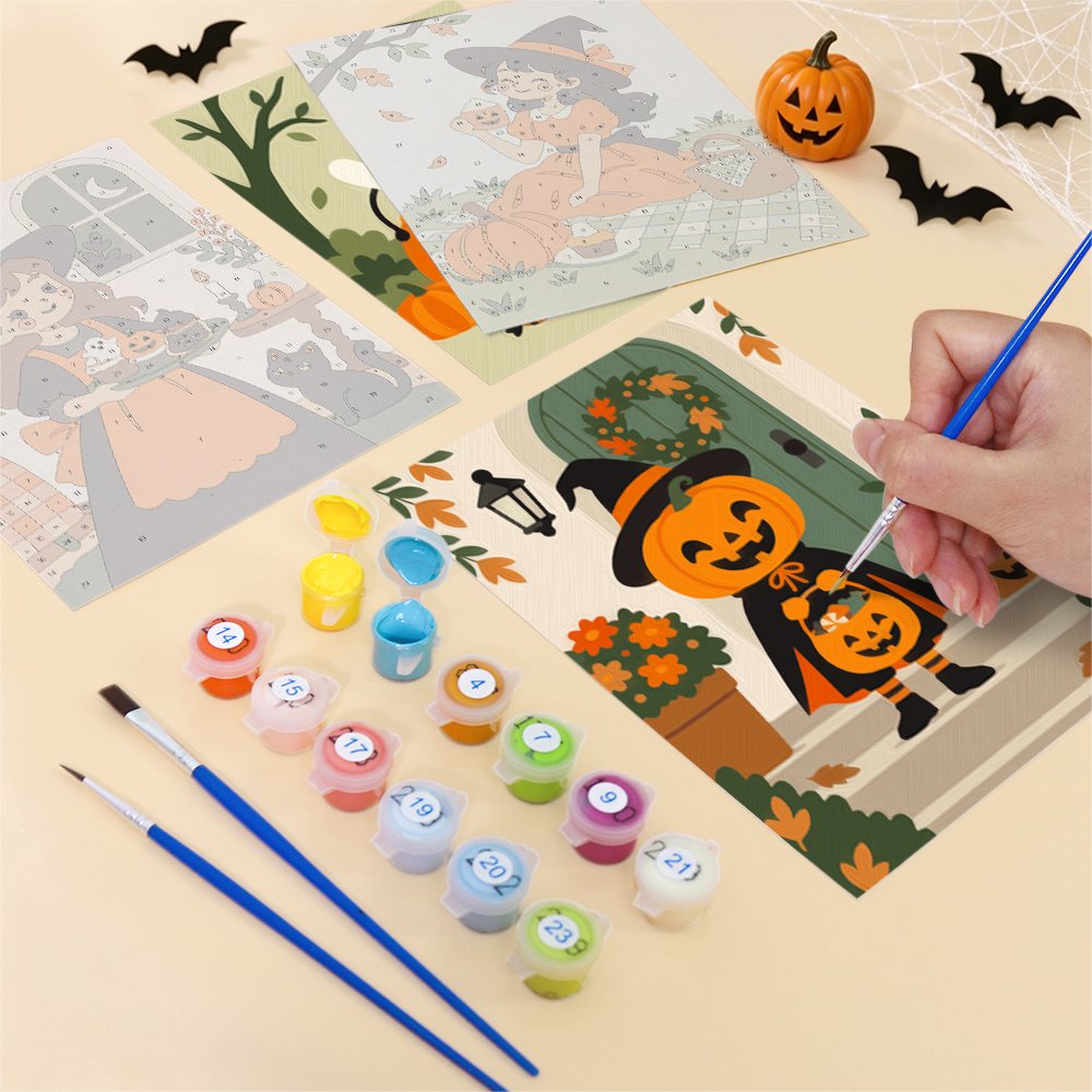 Filling in a Little Autumn Witches mini canvas with numbered acrylic paints and a fine brush