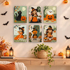 Little Autumn Witches mini paintings displayed as a gallery wall in a sunny kitchen