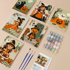 Little Autumn Witches mini paint by numbers kit with six numbered canvases, acrylic paints, brushes and layout