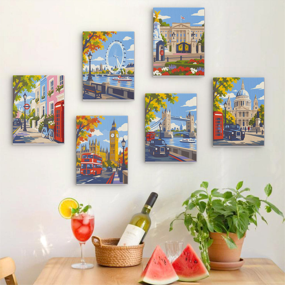 Six finished London Days mini paintings hung on a wall above a table