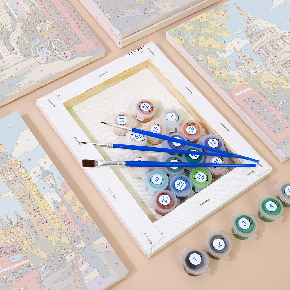 Numbered paint pots and brushes on a pre-stretched London Days mini canvas