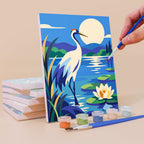 Painting a Masterpiece Remix mini canvas propped up beside numbered acrylic paints