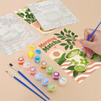 Filling in a Matcha Moments mini canvas with numbered acrylic paints and a fine brush