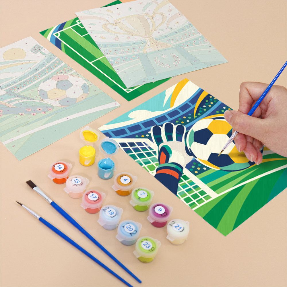 Filling in a Matchday Magic mini canvas with numbered acrylic paints and a fine brush