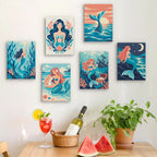 Six finished Mermaid Tales mini paintings hung on a wall above a table