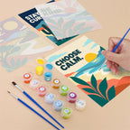 Filling in a Mindful Mantras mini canvas with numbered acrylic paints and a fine brush