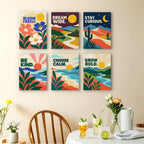 Mindful Mantras mini paintings displayed as a gallery wall in a sunny kitchen