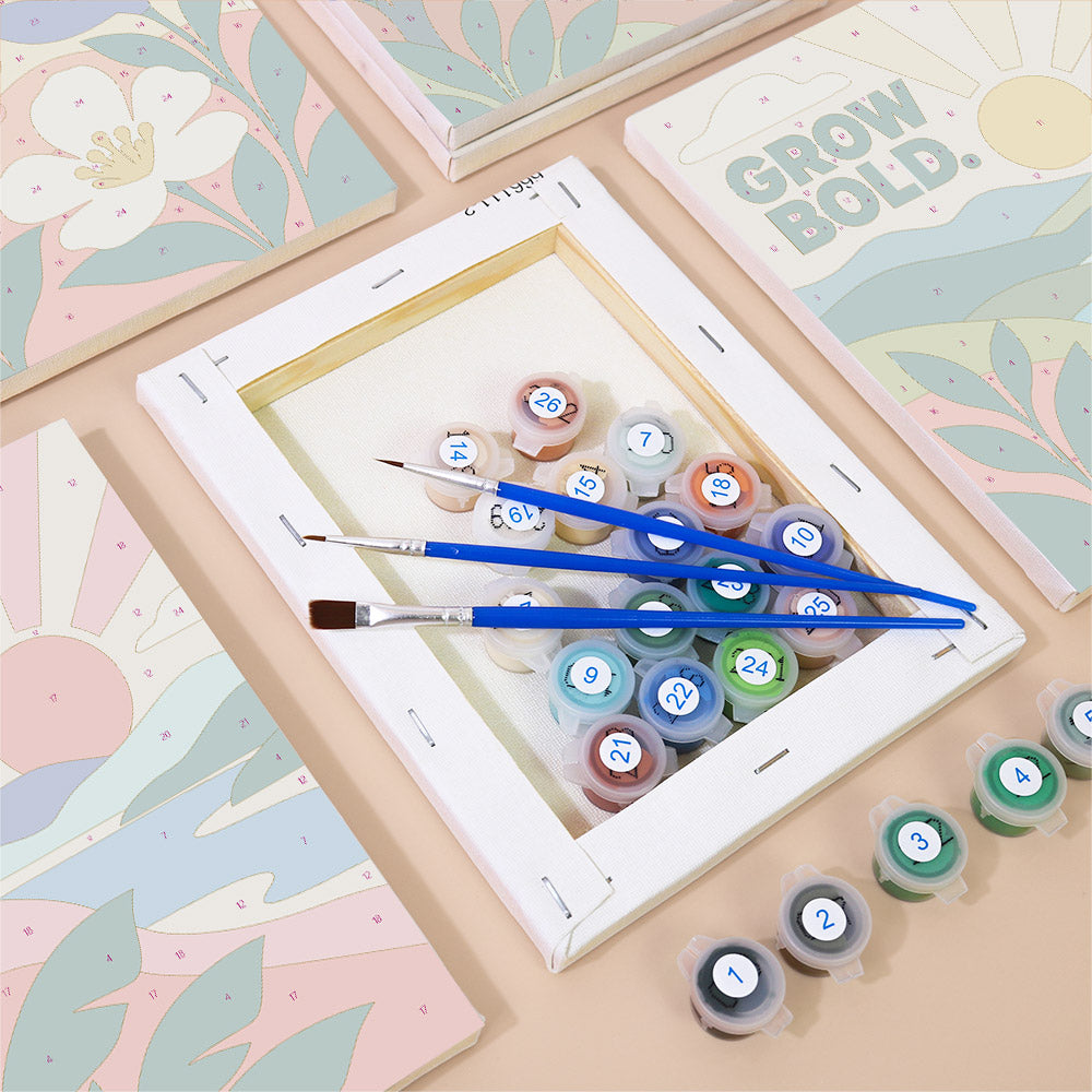 Numbered paint pots and brushes on a pre-stretched Mindful Mantras mini canvas
