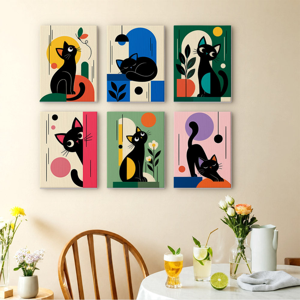 Mod Cats mini paintings displayed as a gallery wall in a sunny kitchen
